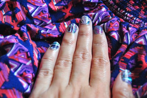 water marble nail art on fingernails - nails art stock pictures, royalty-free photos & images