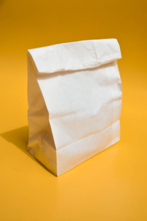 white paper bag lunch bag - junk food stock pictures, royalty-free photos & images