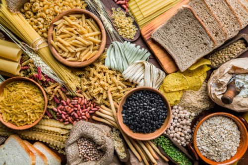 wholegrain and dietary fiber food on rustic wooden background - food stock pictures, royalty-free photos & images