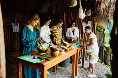 wide shot of group of friends taking traditional mayan cooking class while on vacation - food stock pictures, royalty-free photos & images