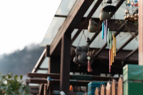 wind chimes in the rest pavilion - garden decoration stock pictures, royalty-free photos & images