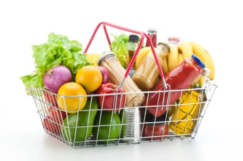 wire shopping basket filled with groceries and vegetables - food stock pictures, royalty-free photos & images