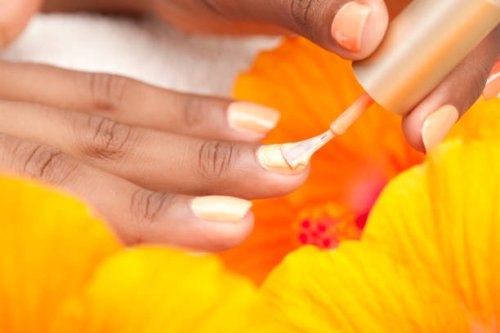 woman applying nail polish - nails art stock pictures, royalty-free photos & images