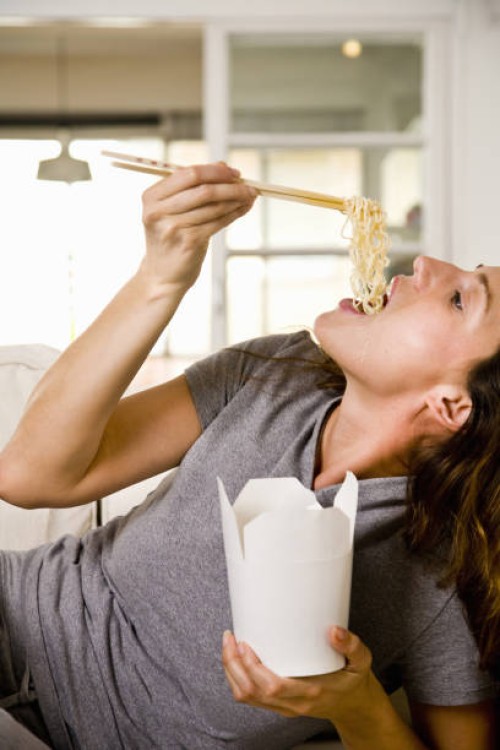 woman at home - junk food stock pictures, royalty-free photos & images