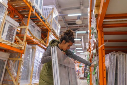 woman buying materials to renovate her house - home decoration stock pictures, royalty-free photos & images