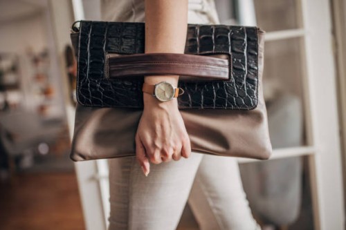 woman carrying modern leather purse - fashion stock pictures, royalty-free photos & images