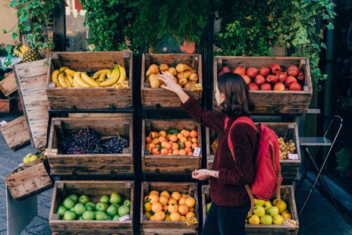 woman choosing fresh fruits on the street of florence - food stock pictures, royalty-free photos & images