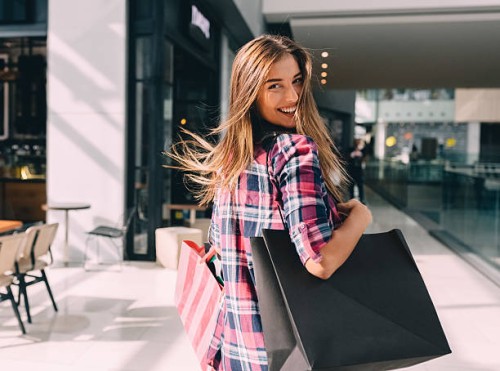 woman enjoying the weekend in the shopping mall - fashion stock pictures, royalty-free photos & images