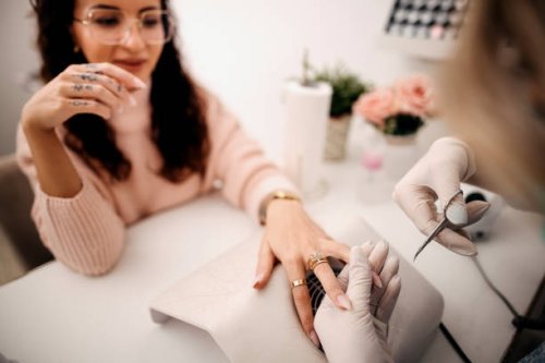 woman getting nails done - nails art stock pictures, royalty-free photos & images