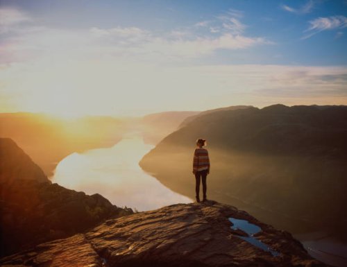 woman hiking in mountains on the background of lysefjorden - travel stock pictures, royalty-free photos & images