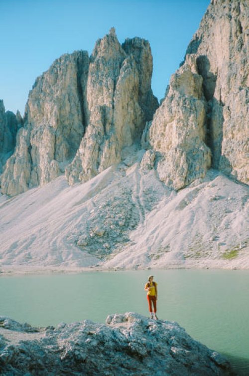 woman hiking near lake antermoia in dolomites - travel stock pictures, royalty-free photos & images