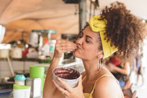 woman holding a bowl with acai at belem do para - food stock pictures, royalty-free photos & images