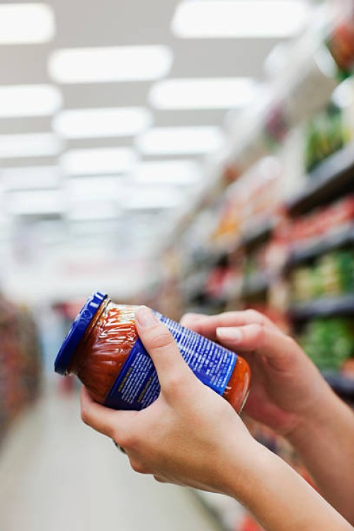 woman holding jar of food - food stock pictures, royalty-free photos & images