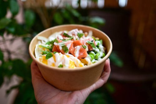woman holding take away food. - food stock pictures, royalty-free photos & images