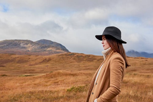 woman in autumnal landscape - fashion stock pictures, royalty-free photos & images