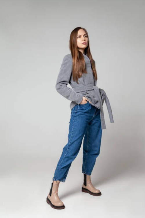 woman in fashionable outfit in studio - fashion stock pictures, royalty-free photos & images