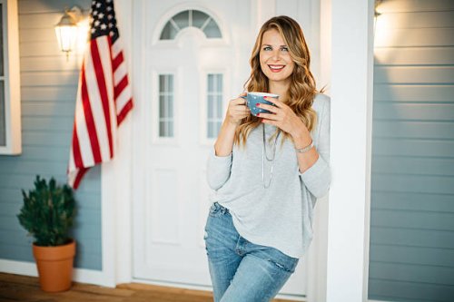 woman in front of a house. - garden decoration stock pictures, royalty-free photos & images