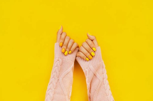woman in sweater with colorful manicure. trending bright backdrop of the year. perfect nails concept - nails art stock pictures, royalty-free photos & images