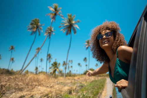 woman looking out the car window - travel stock pictures, royalty-free photos & images
