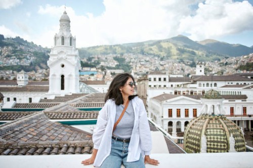 woman on roof of the cathedral of quito, ecuador - travel stock pictures, royalty-free photos & images