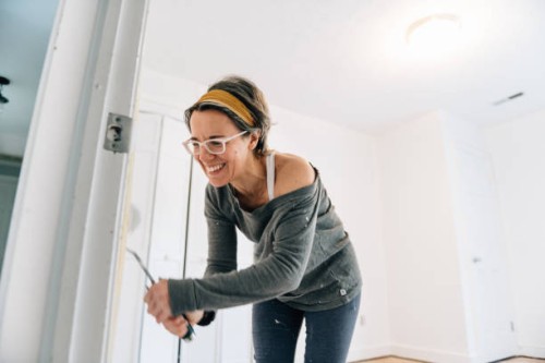woman painting a bedroom - home decoration stock pictures, royalty-free photos & images
