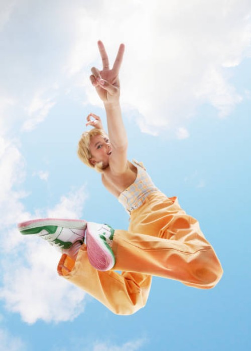 woman posing making peace sign - fashion stock pictures, royalty-free photos & images