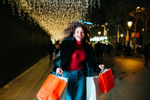 woman running with shopping bags - fashion stock pictures, royalty-free photos & images