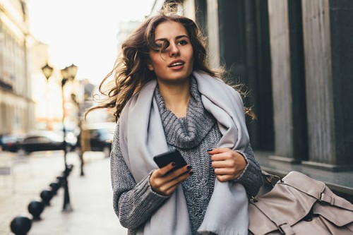 woman rushing down the street - fashion stock pictures, royalty-free photos & images