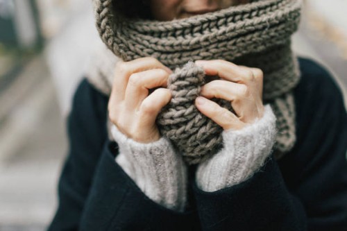 woman's hand holding knitted scarf, close-up - fashion stock pictures, royalty-free photos & images