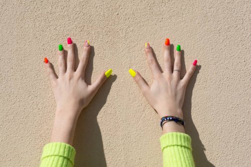 woman's hands with multicolored nail polish - nails art stock pictures, royalty-free photos & images
