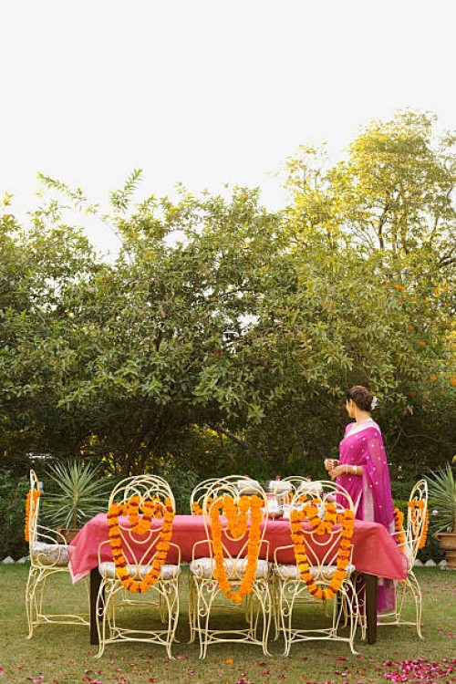 woman setting outdoor table - garden decoration stock pictures, royalty-free photos & images