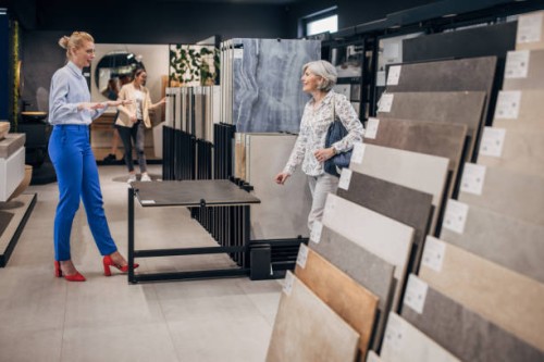 woman shopping for bathroom tiles - home decoration stock pictures, royalty-free photos & images