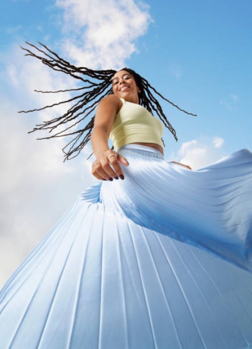 woman swinging around in the sun - fashion stock pictures, royalty-free photos & images