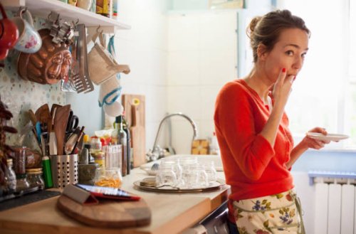 woman tasting freshly made marmalade from saucer - food stock pictures, royalty-free photos & images