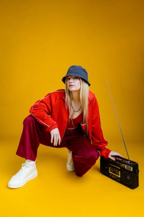 woman wearing 80s hip hop style outfit - fashion stock pictures, royalty-free photos & images