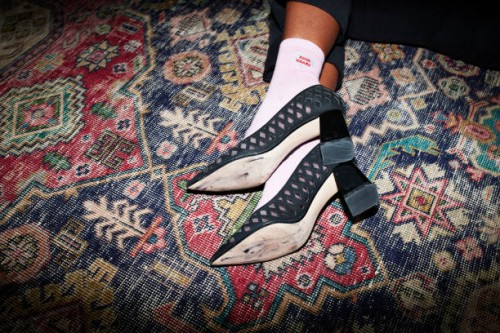 woman wearing high heels lying on carpet - fashion stock pictures, royalty-free photos & images
