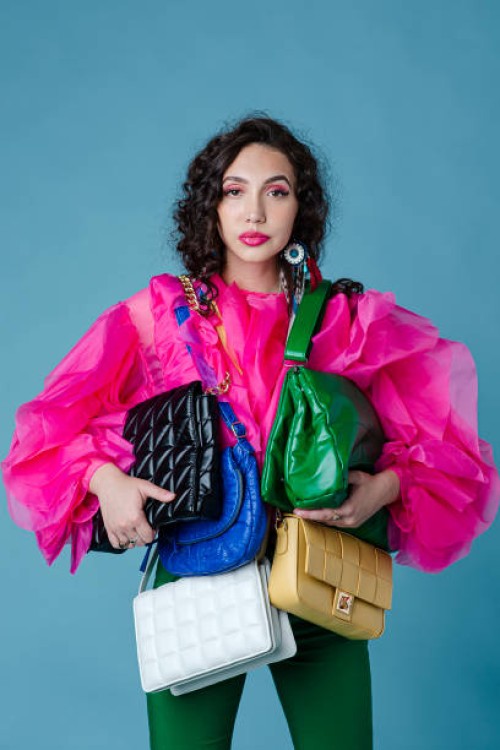 woman with many purses - fashion stock pictures, royalty-free photos & images