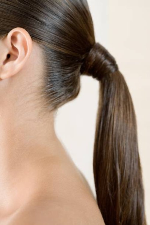 woman with ponytail - hairstyle stock-fotos und bilder