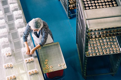 woman working at bakery workshop - food stock pictures, royalty-free photos & images