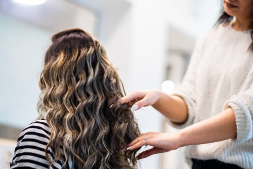 women with beautiful long black hair at treatment in hairstylist salon - hairstyle stock pictures, royalty-free photos & images