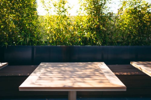 wooden table - garden decoration stock pictures, royalty-free photos & images