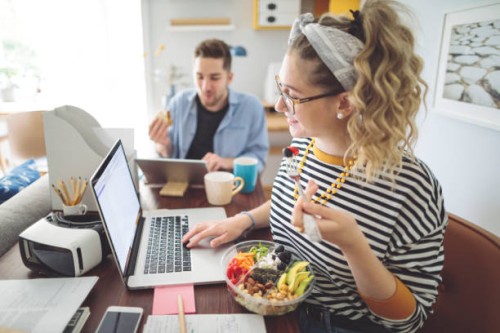 working at home - home office - junk food stock pictures, royalty-free photos & images