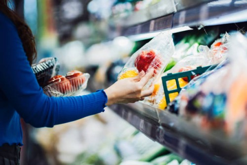 young asian woman shopping for fresh organic groceries in supermarket - food stock pictures, royalty-free photos & images