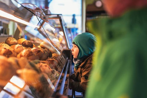 young brothers buying bread. - food stock pictures, royalty-free photos & images