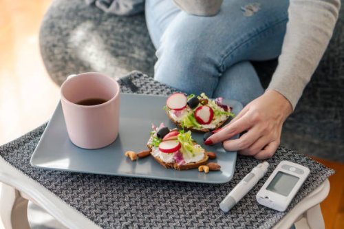 young diabetic woman having breakfast at home - food stock pictures, royalty-free photos & images