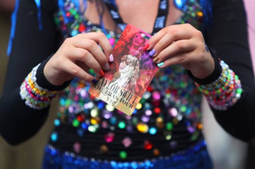 Young fan displays her ticket for Taylor Swift's first Sydney concert outside Accor Stadium on February 23, 2024 in Sydney, Australia. Taylor Swift's...