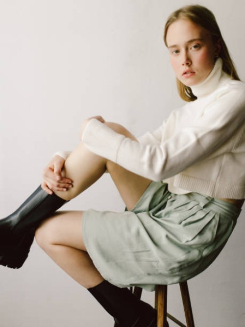 young female fashion model sitting on chair - fashion stock pictures, royalty-free photos & images
