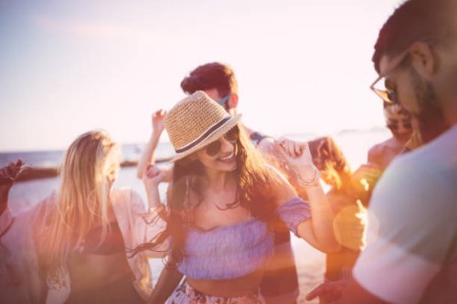young hipster friends on summer holidays dancing at beach party - concert stock pictures, royalty-free photos & images