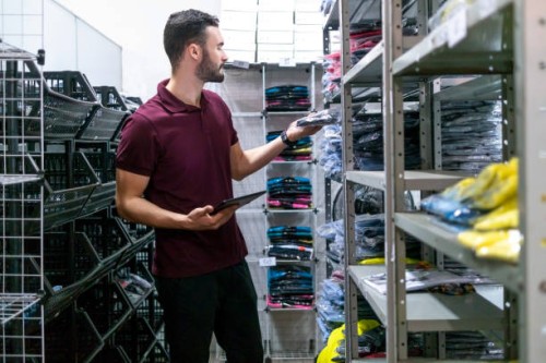young man in a clothes industry - fashion stock pictures, royalty-free photos & images