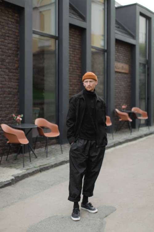 young man in the trendy black outfit - fashion stock pictures, royalty-free photos & images